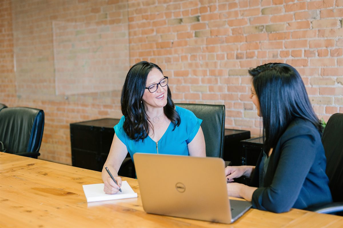 A Beacon advisor reviewing financing options with a business owner